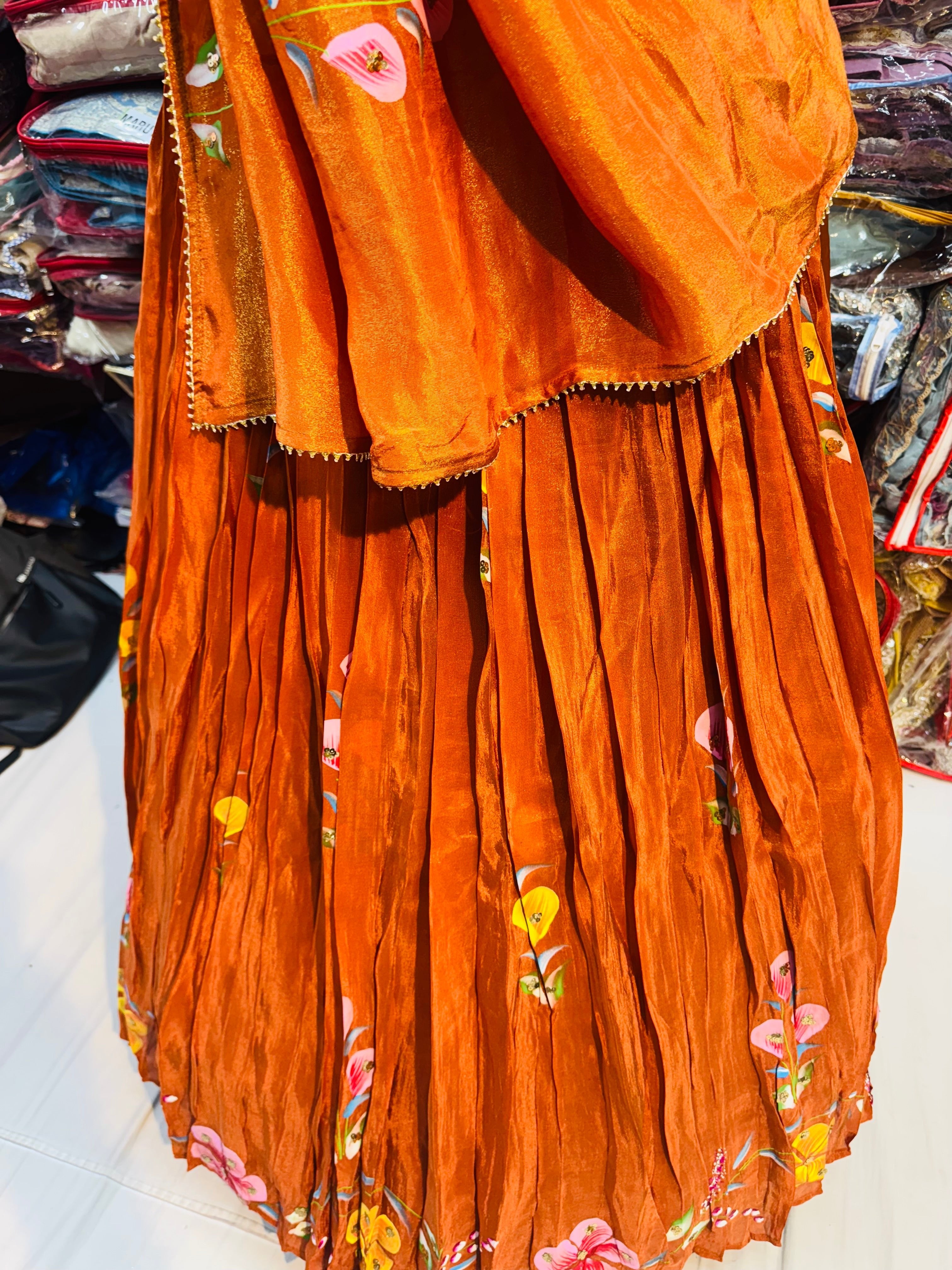Rust orange color floral handpainted lehnga