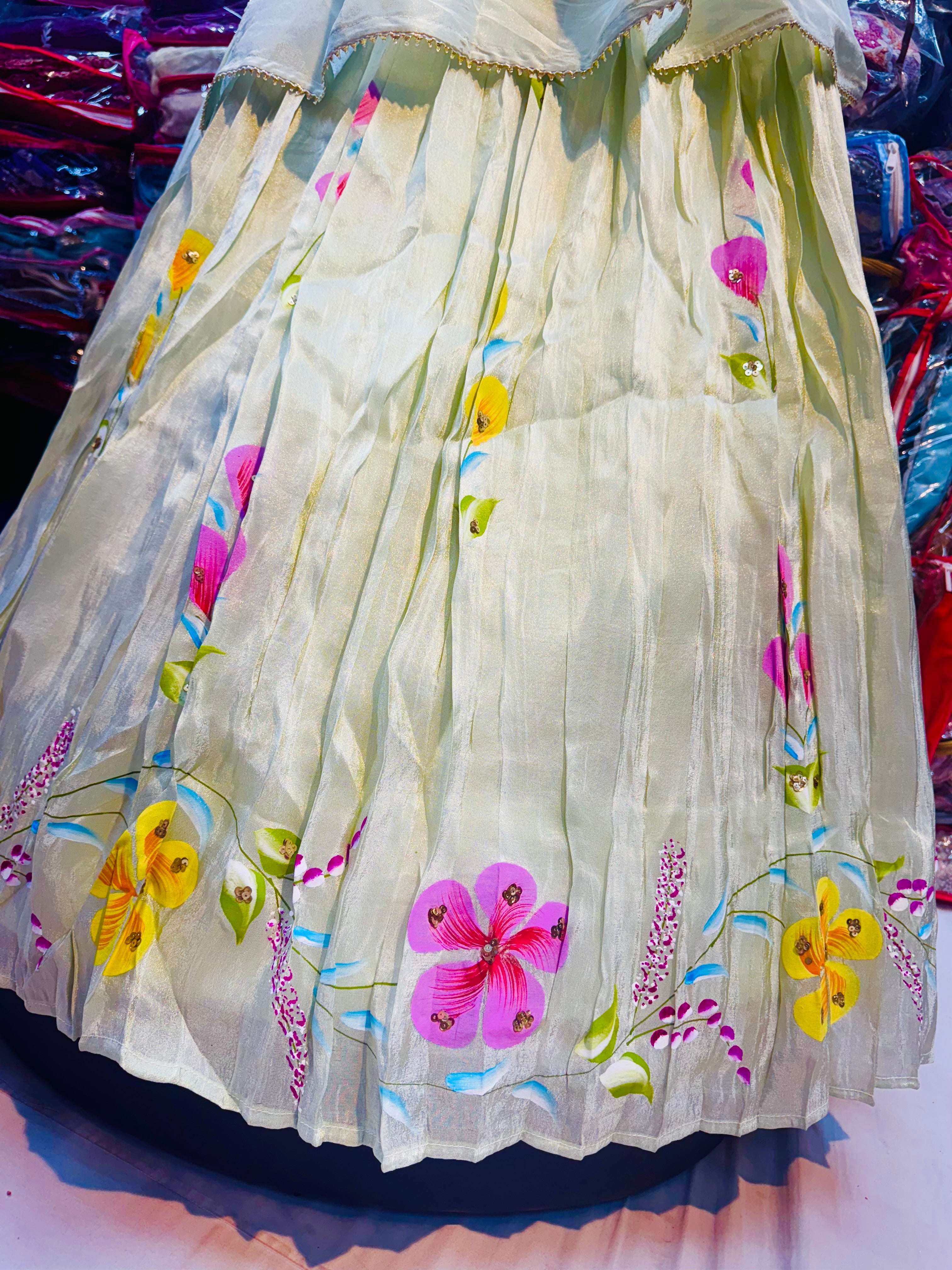Pista green floral handpainted lehnga on tissue fabric