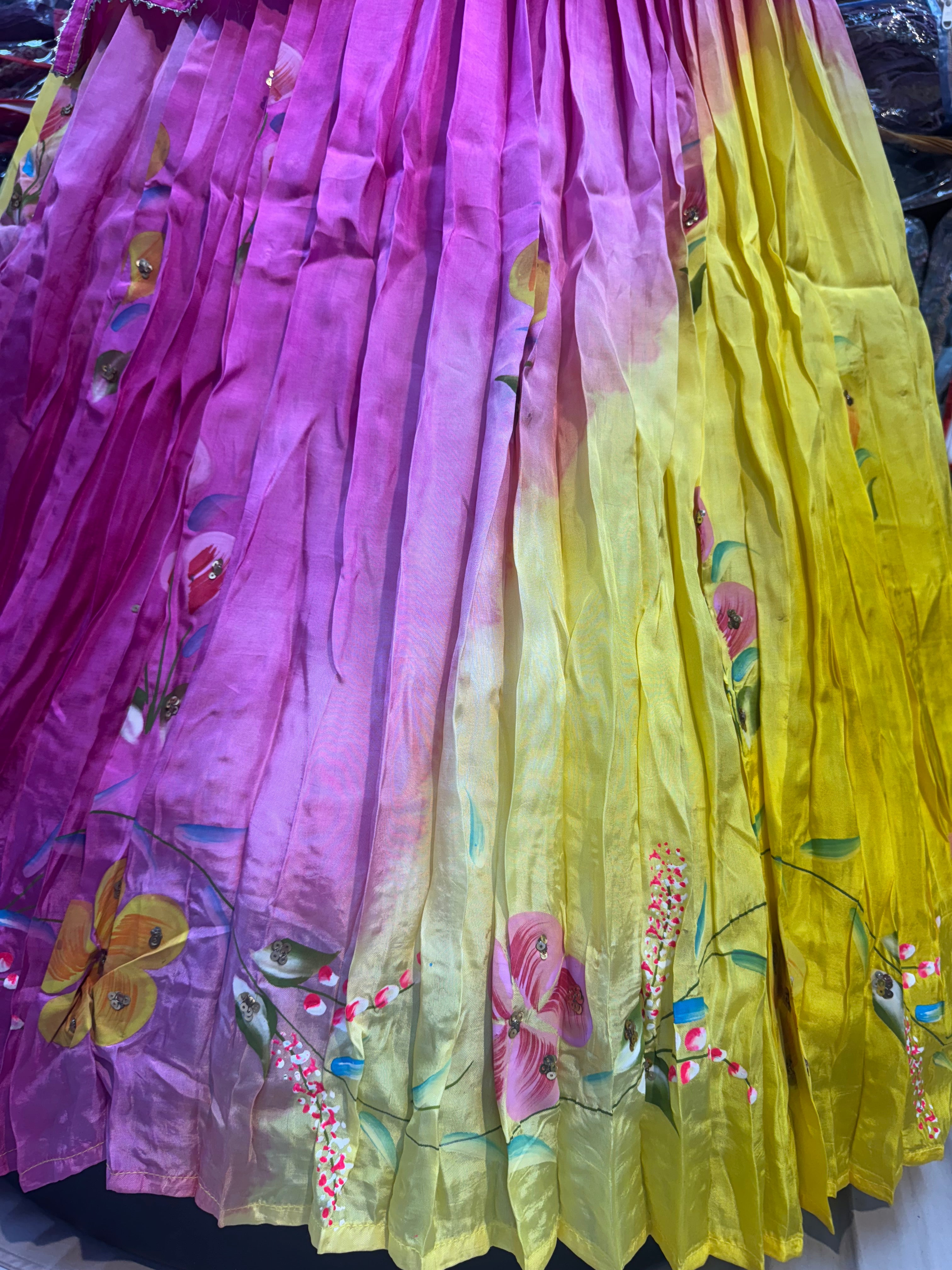 Yellow Rani floral handpainted lehnga on pure upada silk