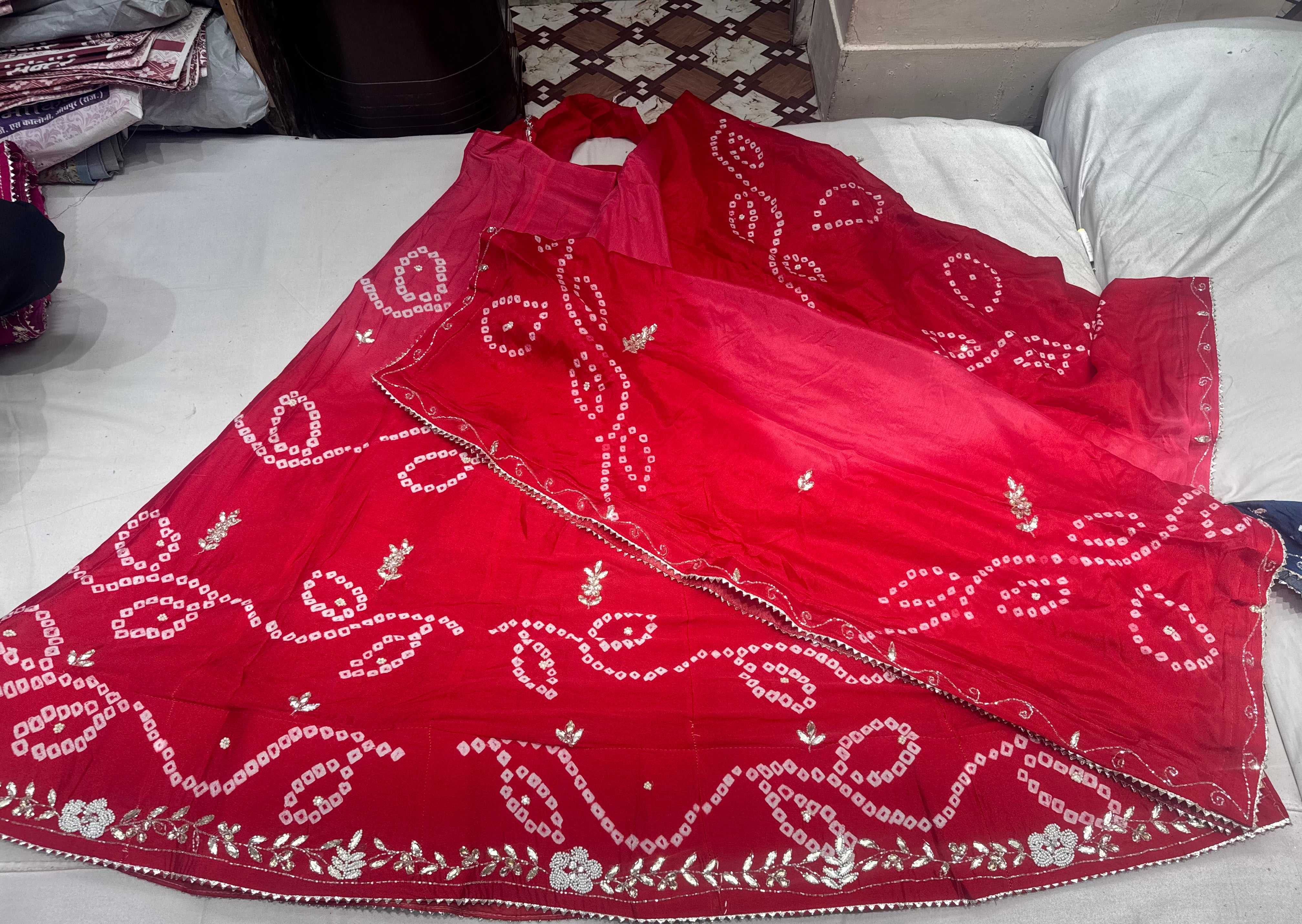 Chinon fabric lehnga with original bandhej and handwork of crystal and gottapatti