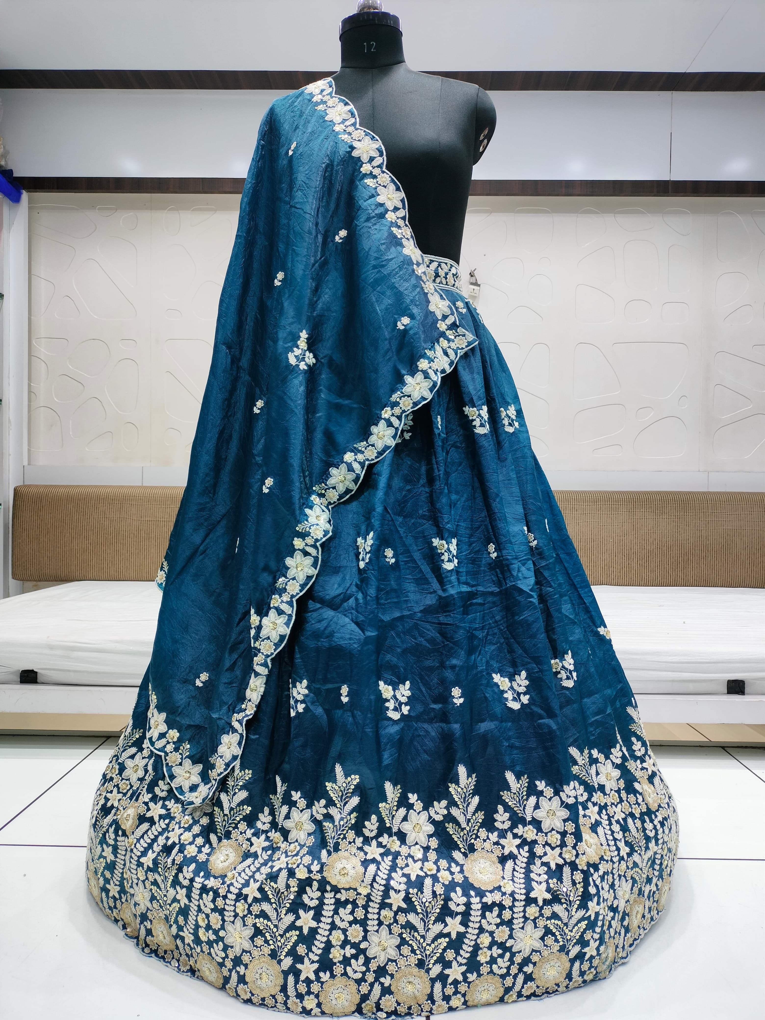 Crush gold fabric lehnga with beautiful embroidery and sequins work & cutwork dupatta