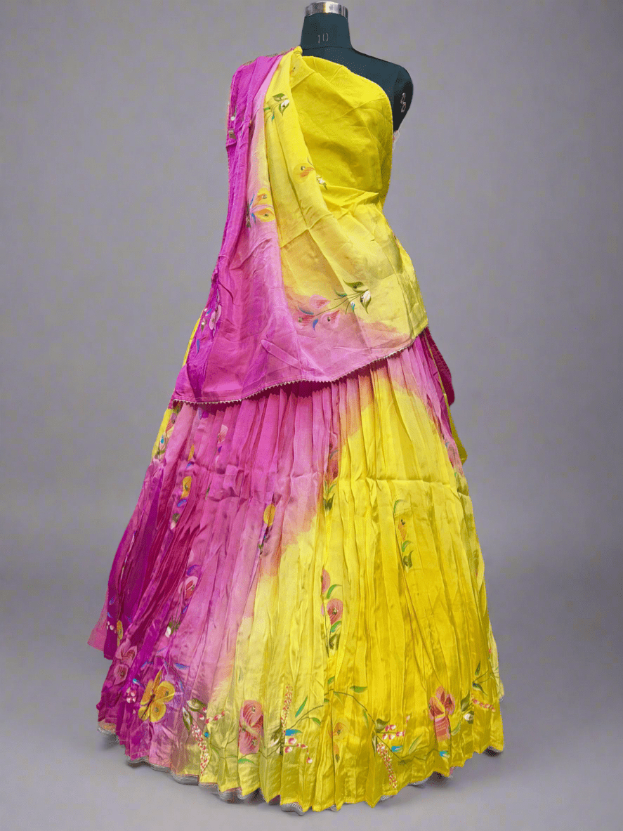Yellow Rani floral handpainted lehnga on pure upada silk