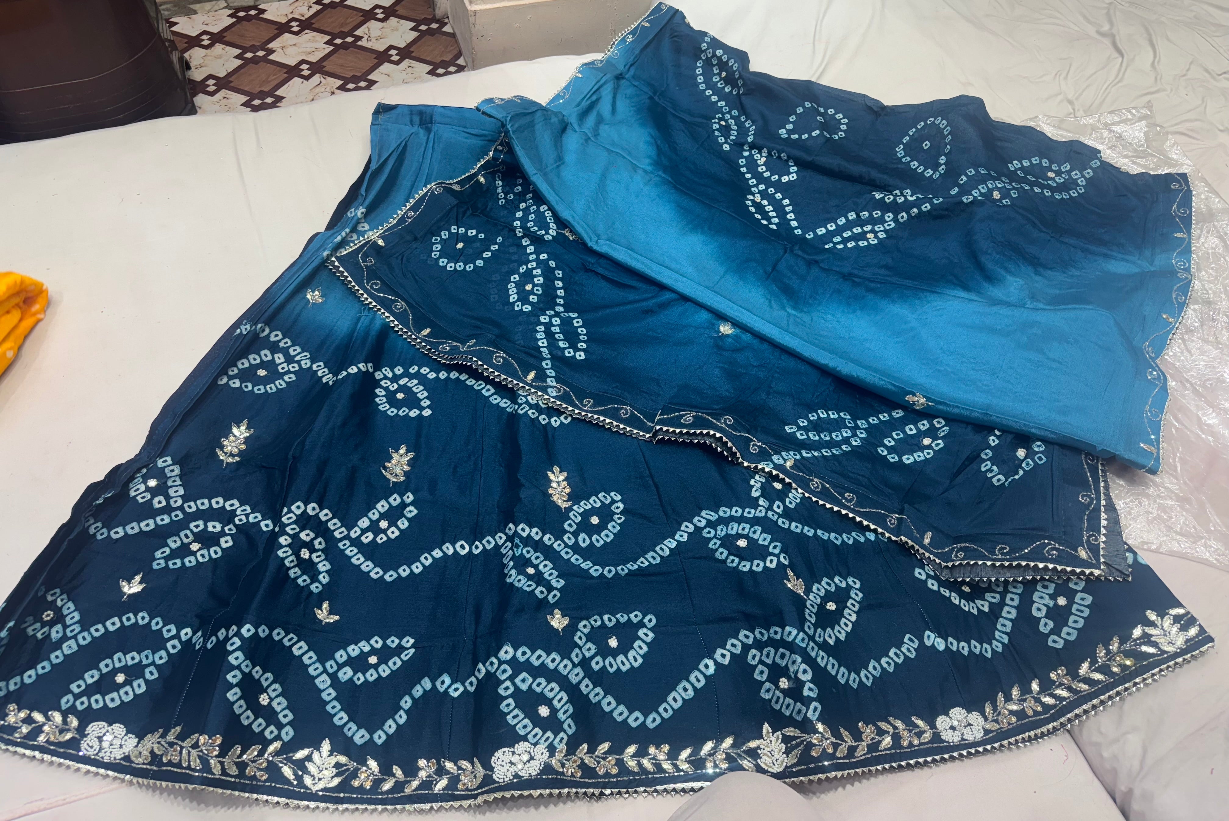 Chinon fabric lehnga with original bandhej and handwork of crystal and gottapatti