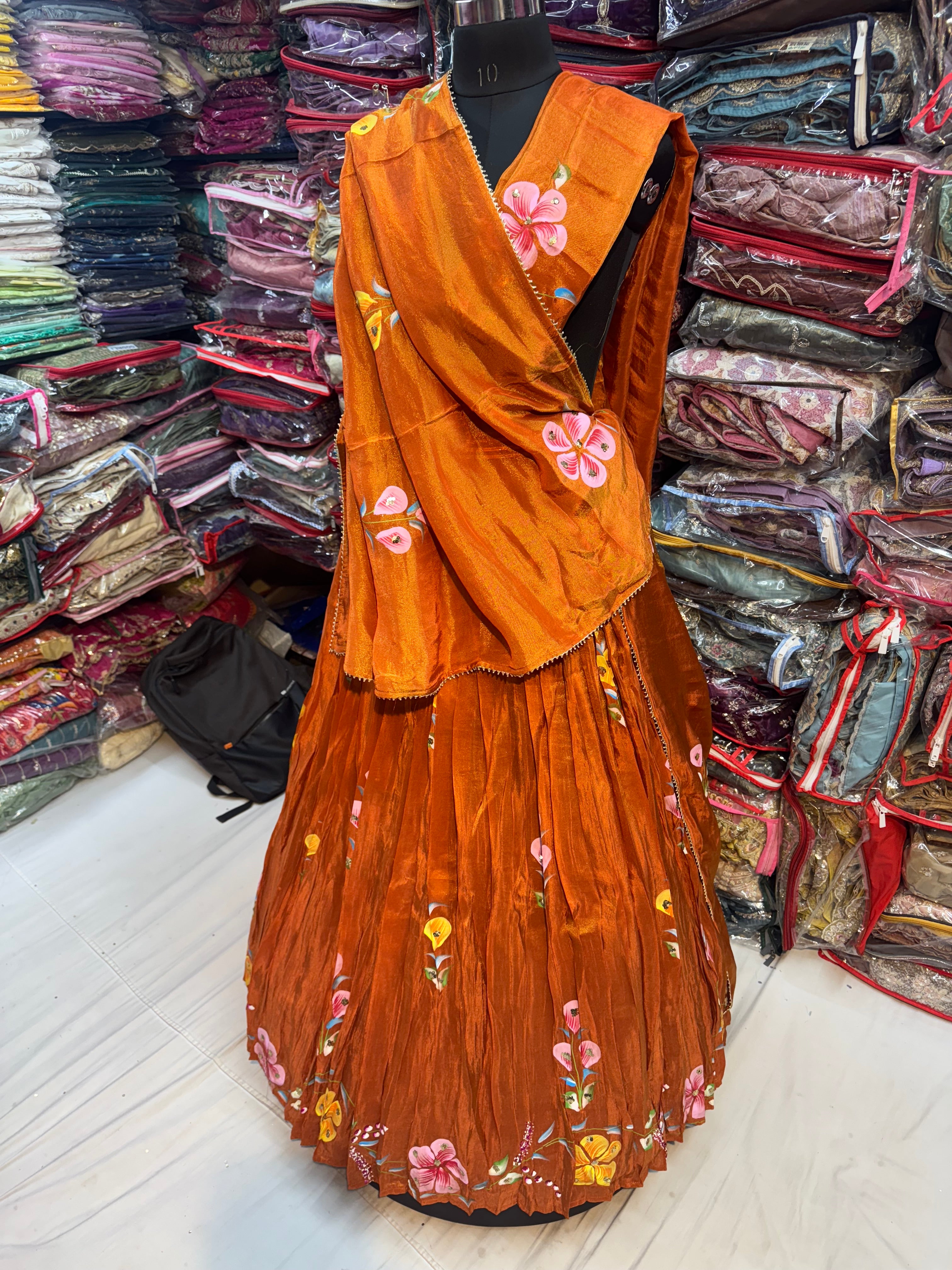 Rust orange color floral handpainted lehnga