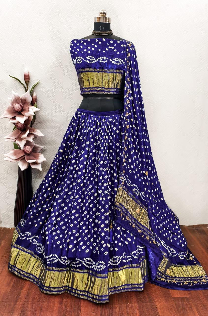 Gajji silk modal dani bandhej lehnga with lagdi patta on lehnga and handwork on dupatta
