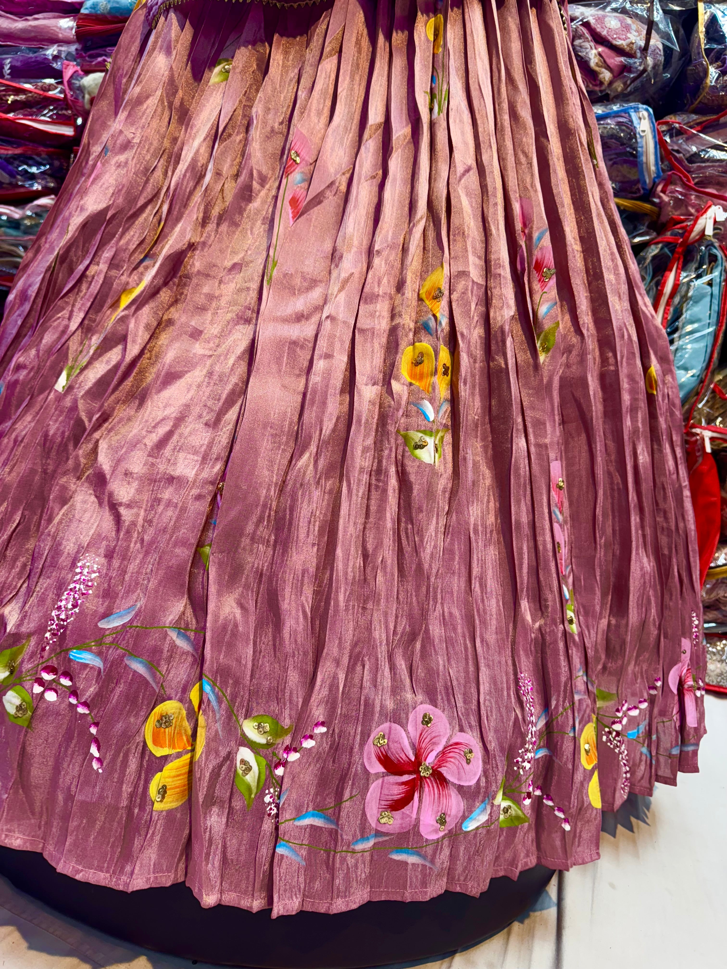 Rose gold color floral handpainted lehnga on tissue fabric