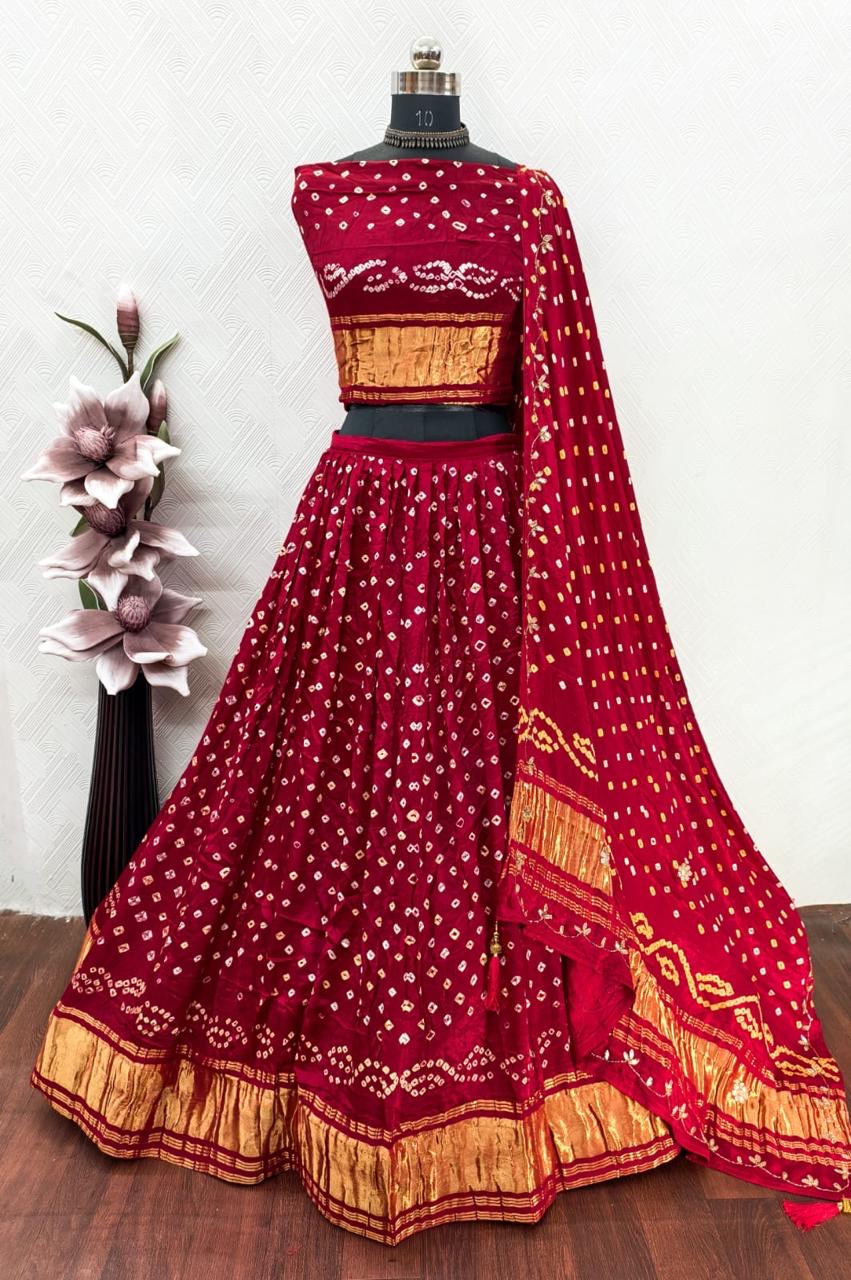 Gajji silk modal dani bandhej lehnga with lagdi patta on lehnga and handwork on dupatta