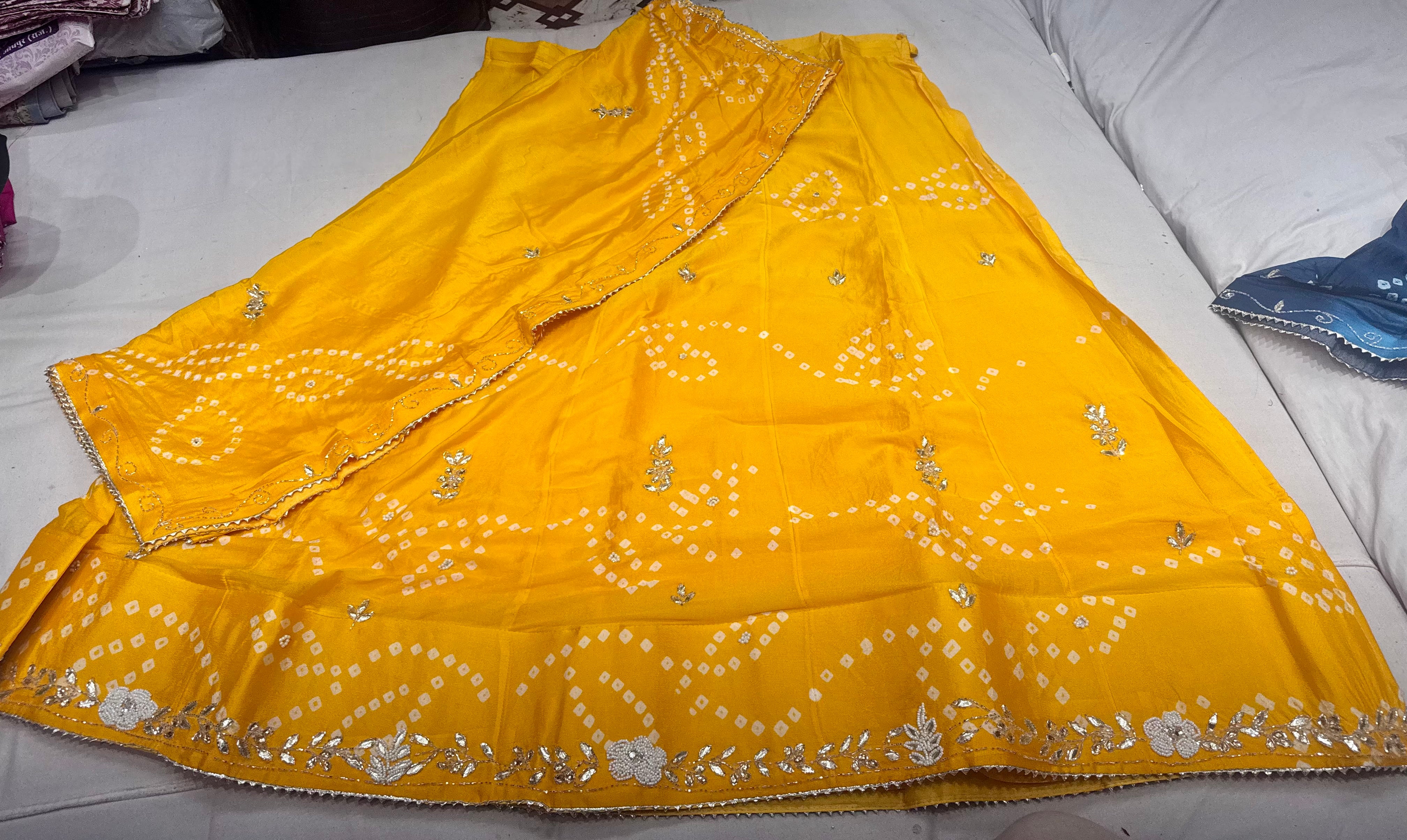 Chinon fabric lehnga with original bandhej and handwork of crystal and gottapatti