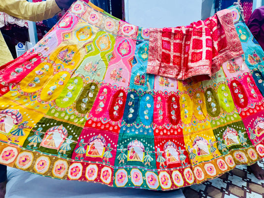 Rajwadi multicolored lehnga with beautiful highlighting of cutdana and pearls.