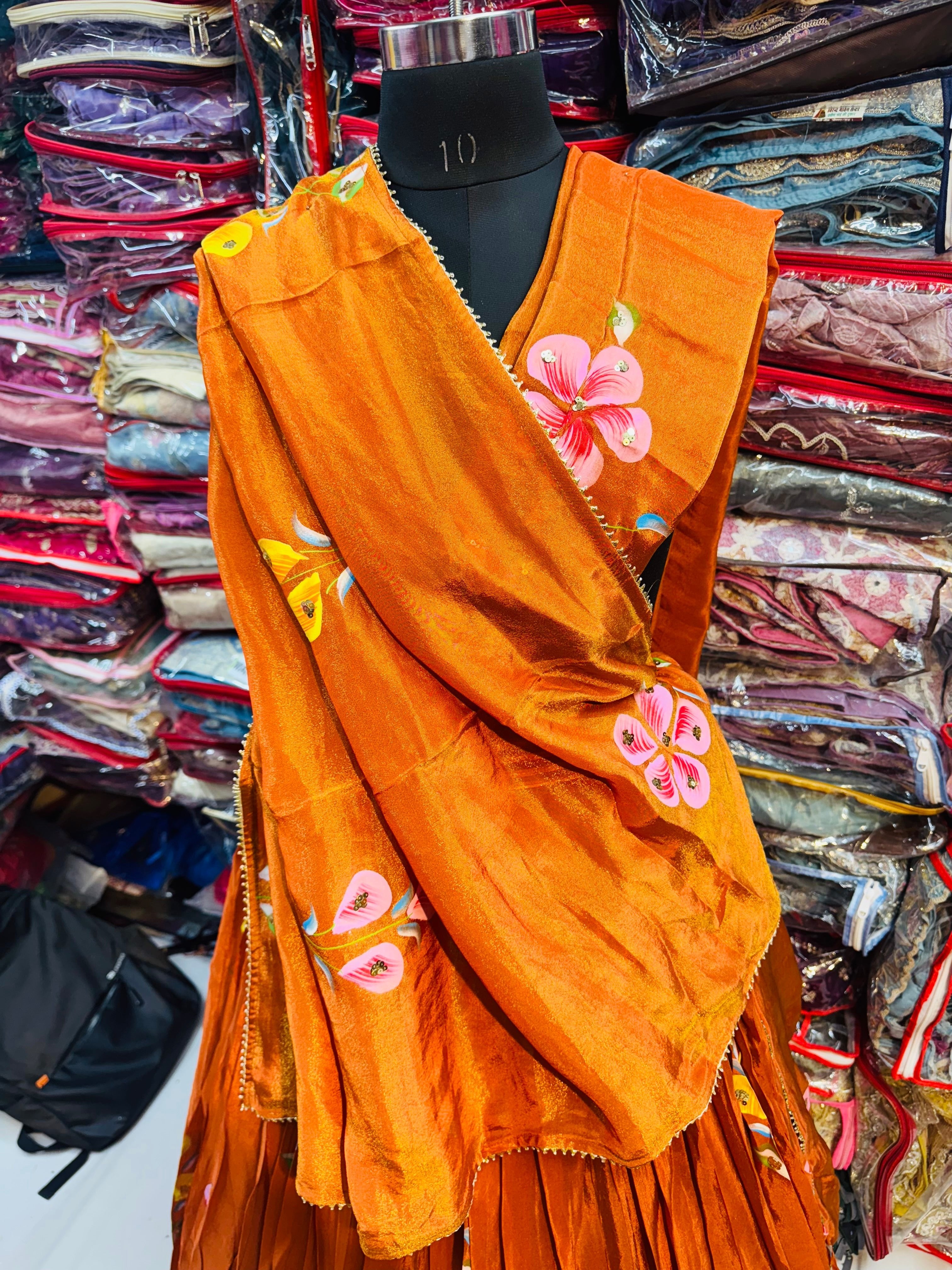 Rust orange color floral handpainted lehnga