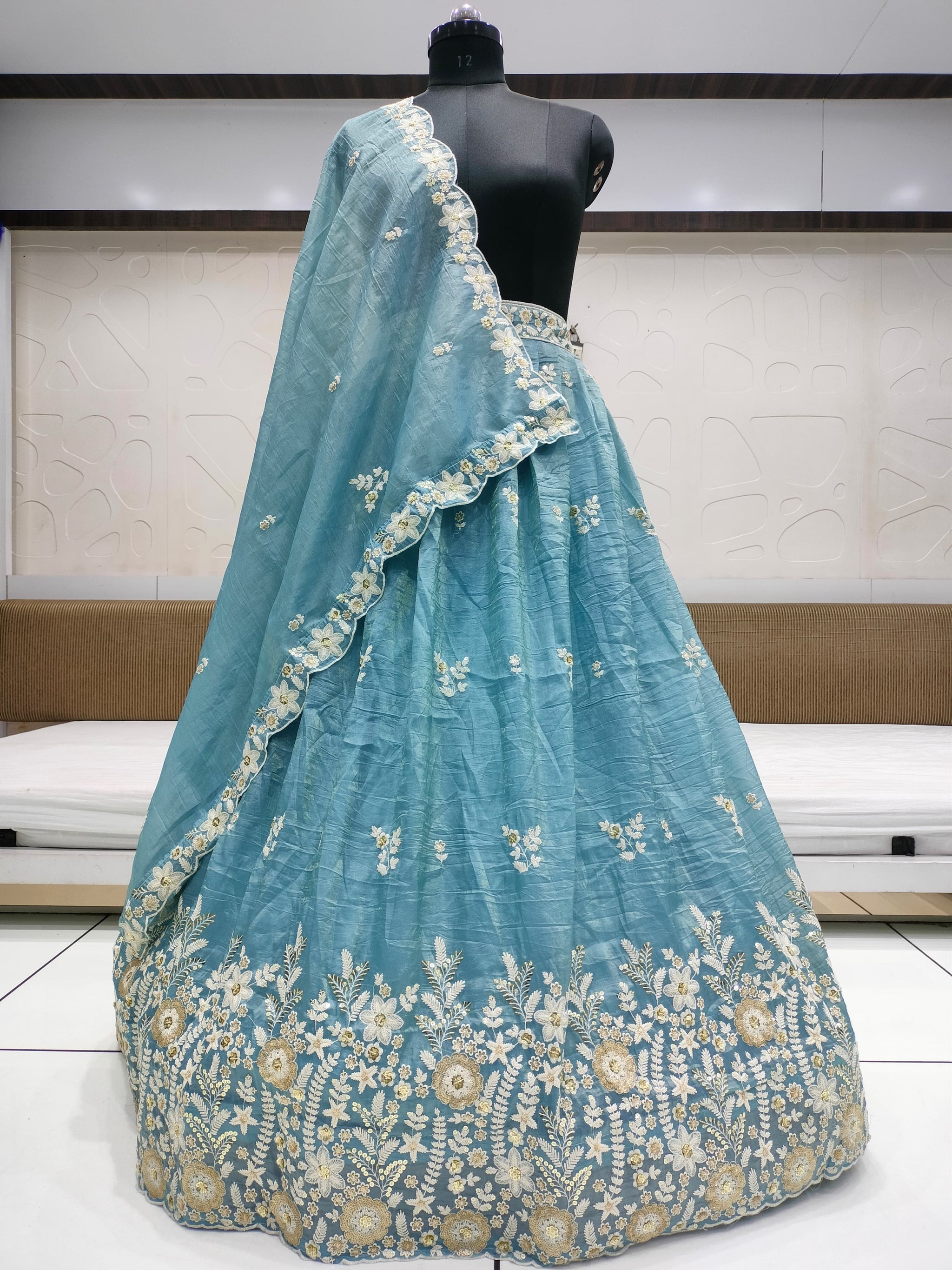 Crush gold fabric lehnga with beautiful embroidery and sequins work & cutwork dupatta