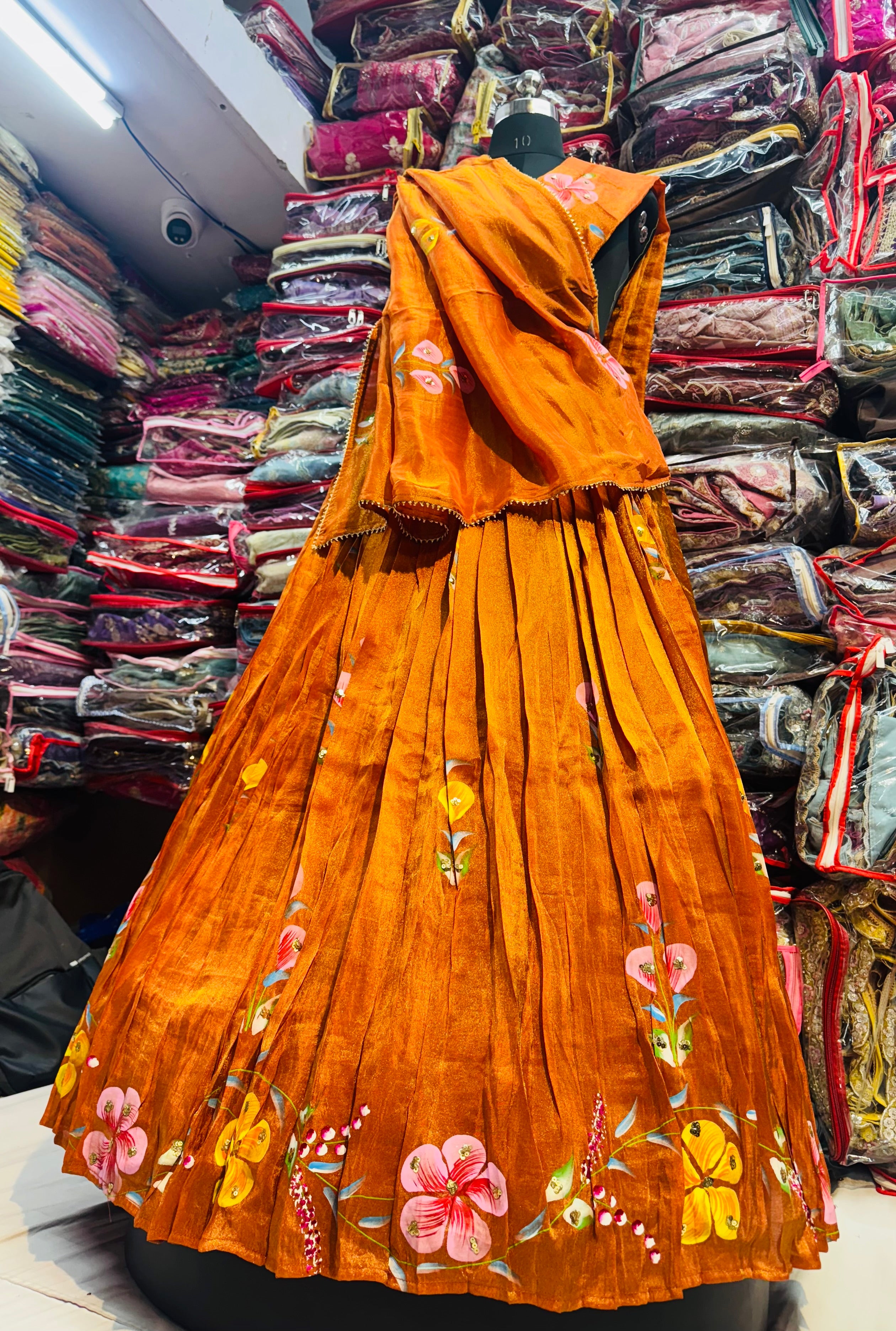 Rust orange color floral handpainted lehnga