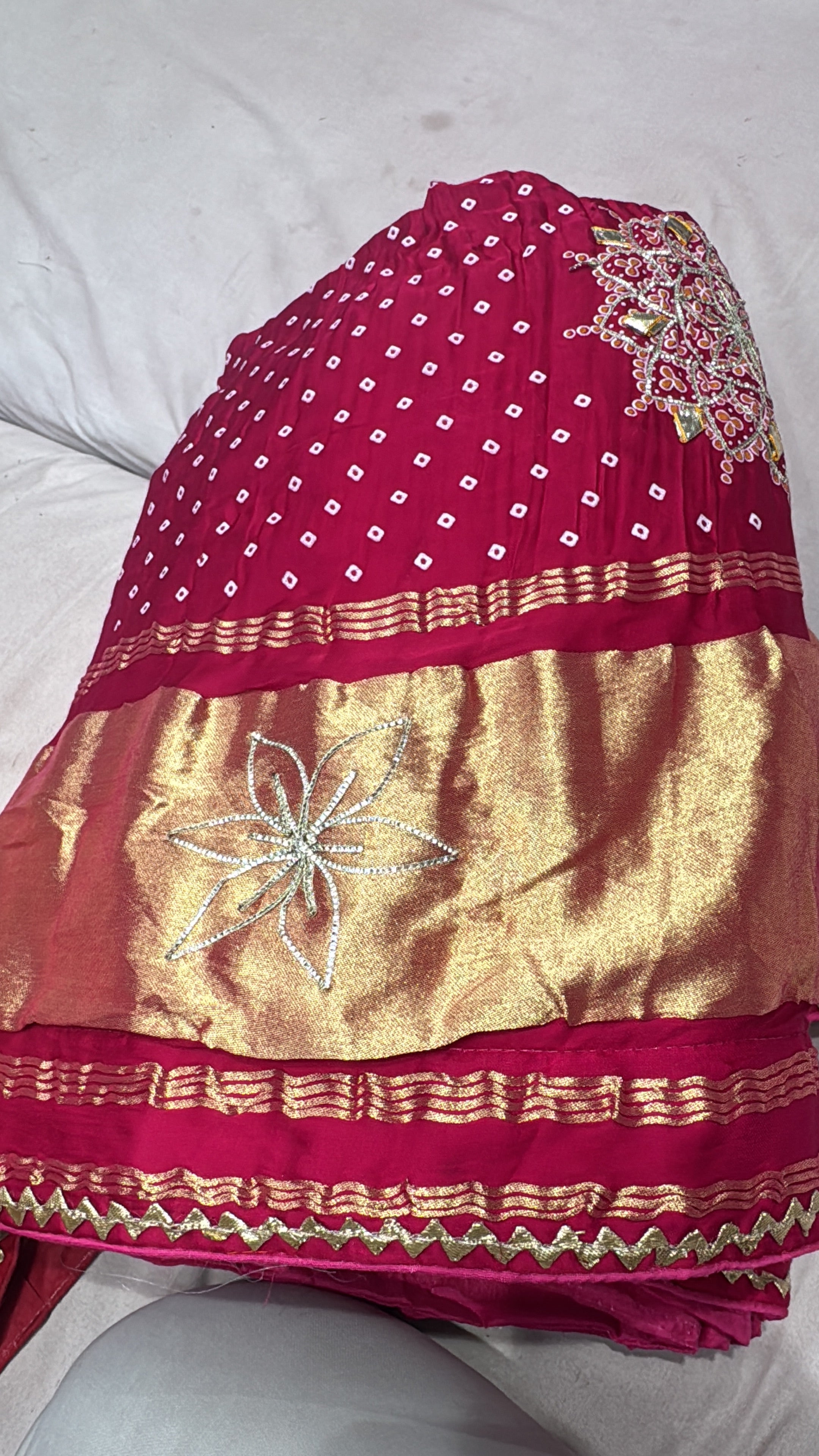 Gajjisilk bandhej print lehnga with beautiful work of sikhiya gotta and concept of lagdi patta
