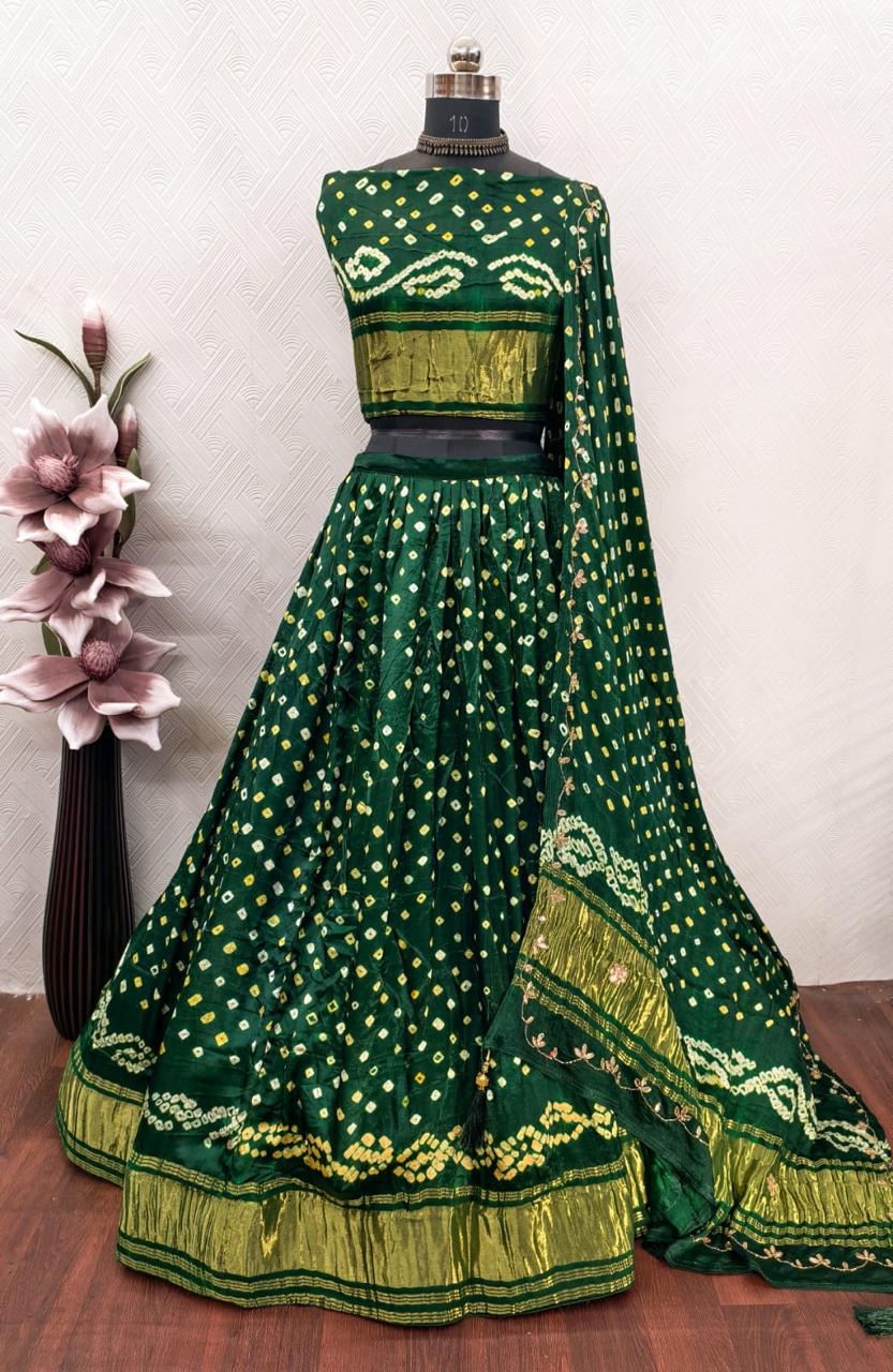 Gajji silk modal dani bandhej lehnga with lagdi patta on lehnga and handwork on dupatta