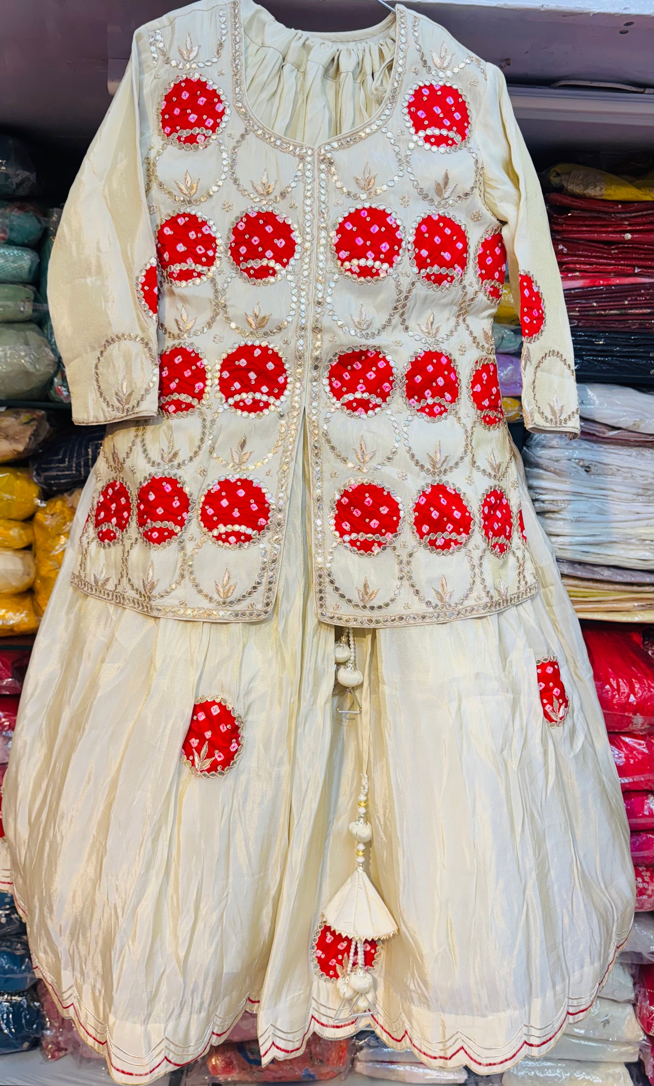 Kanjivaram Tissue silk lehnga with marodi and zardosi work having bandhej pure gajji patches