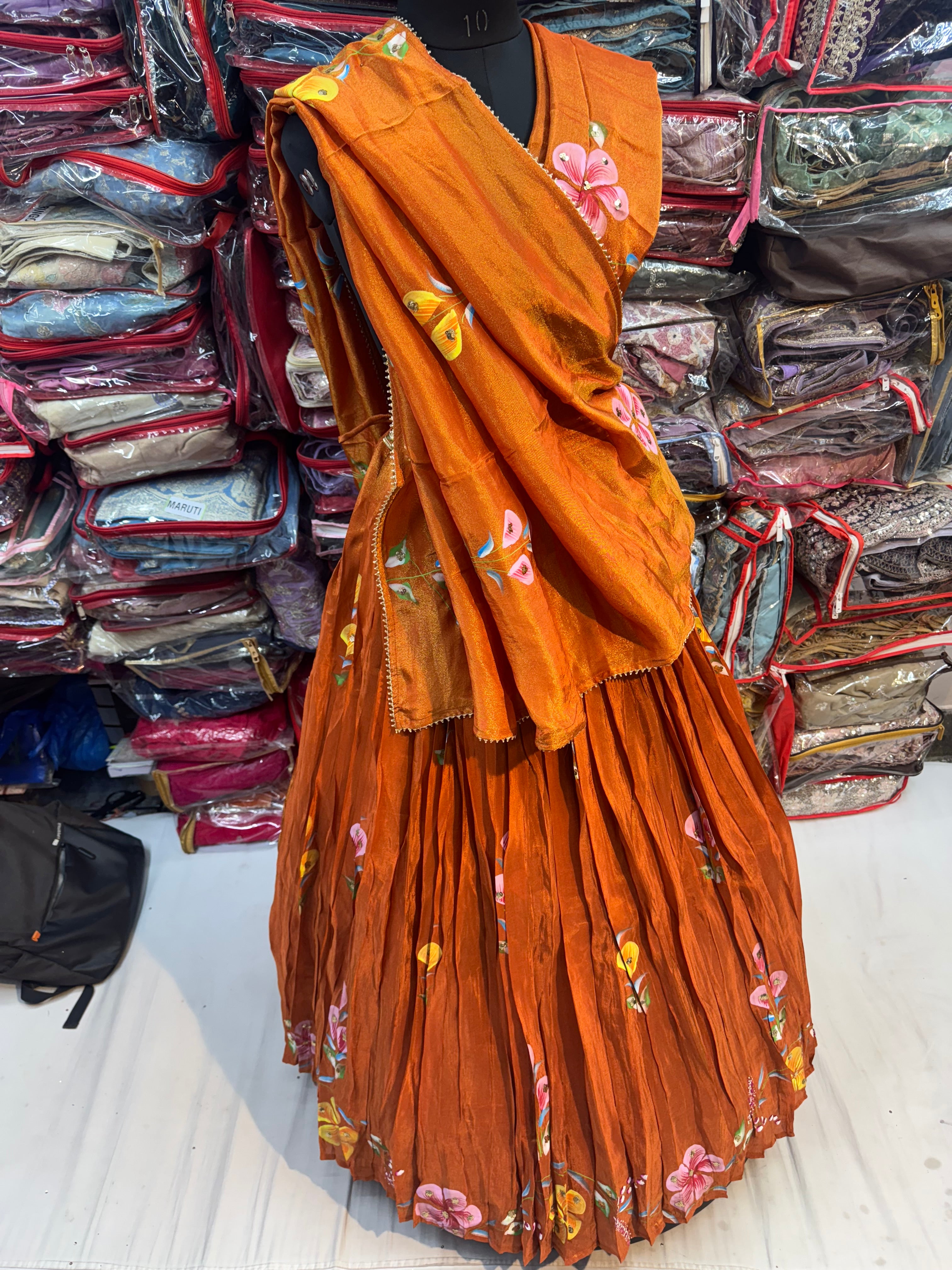 Rust orange color floral handpainted lehnga