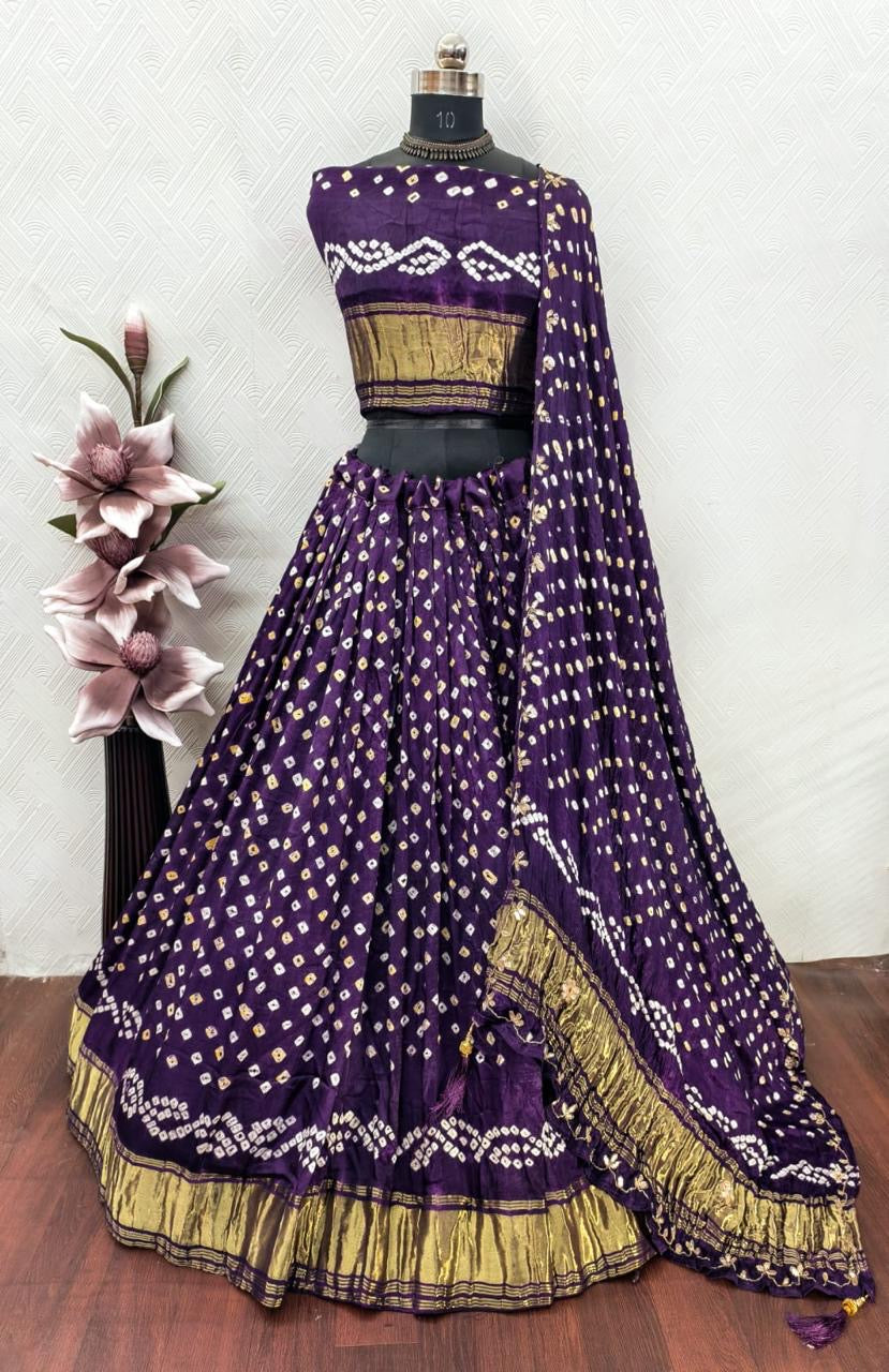Gajji silk modal dani bandhej lehnga with lagdi patta on lehnga and handwork on dupatta