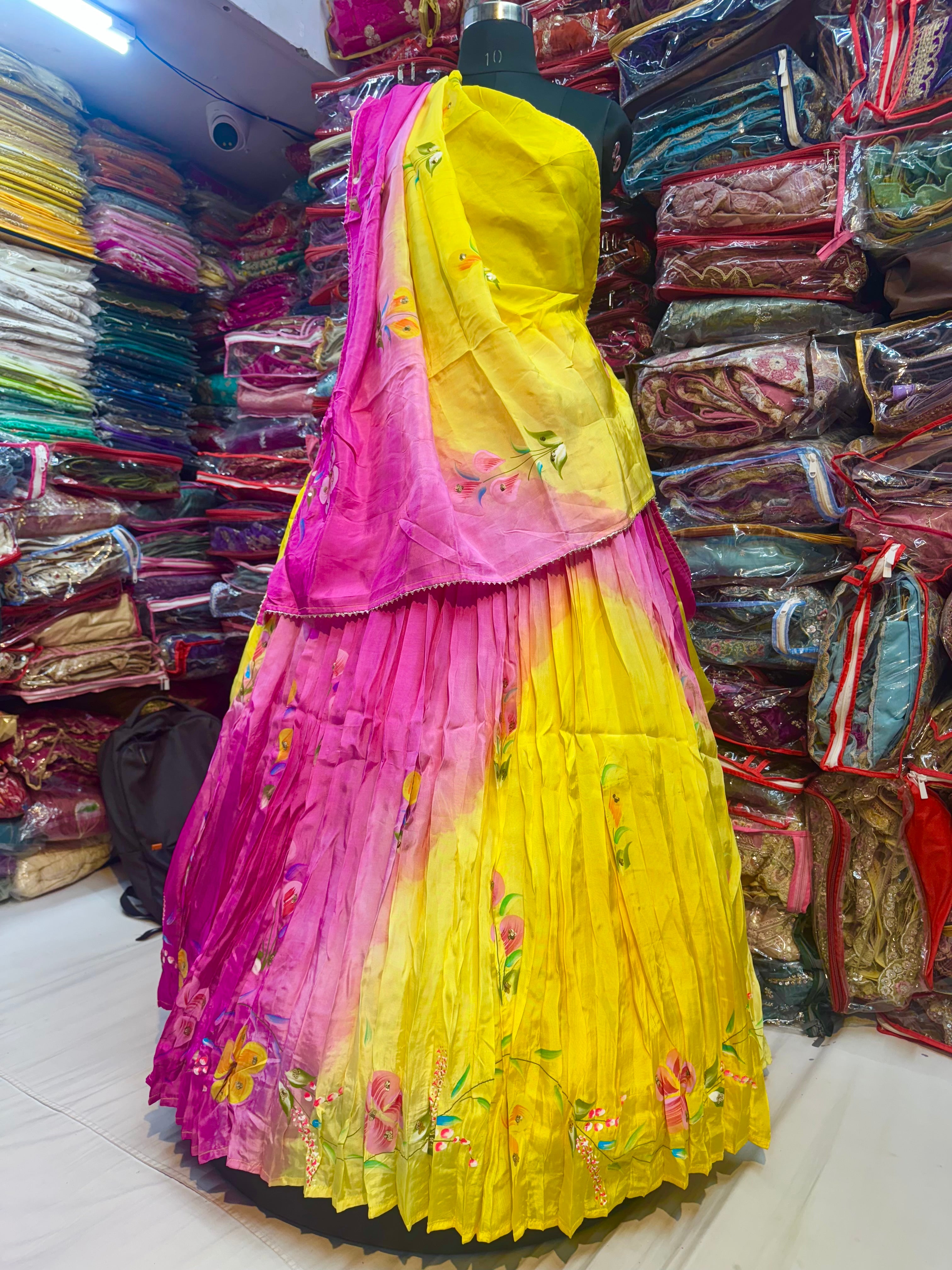 Yellow Rani floral handpainted lehnga on pure upada silk