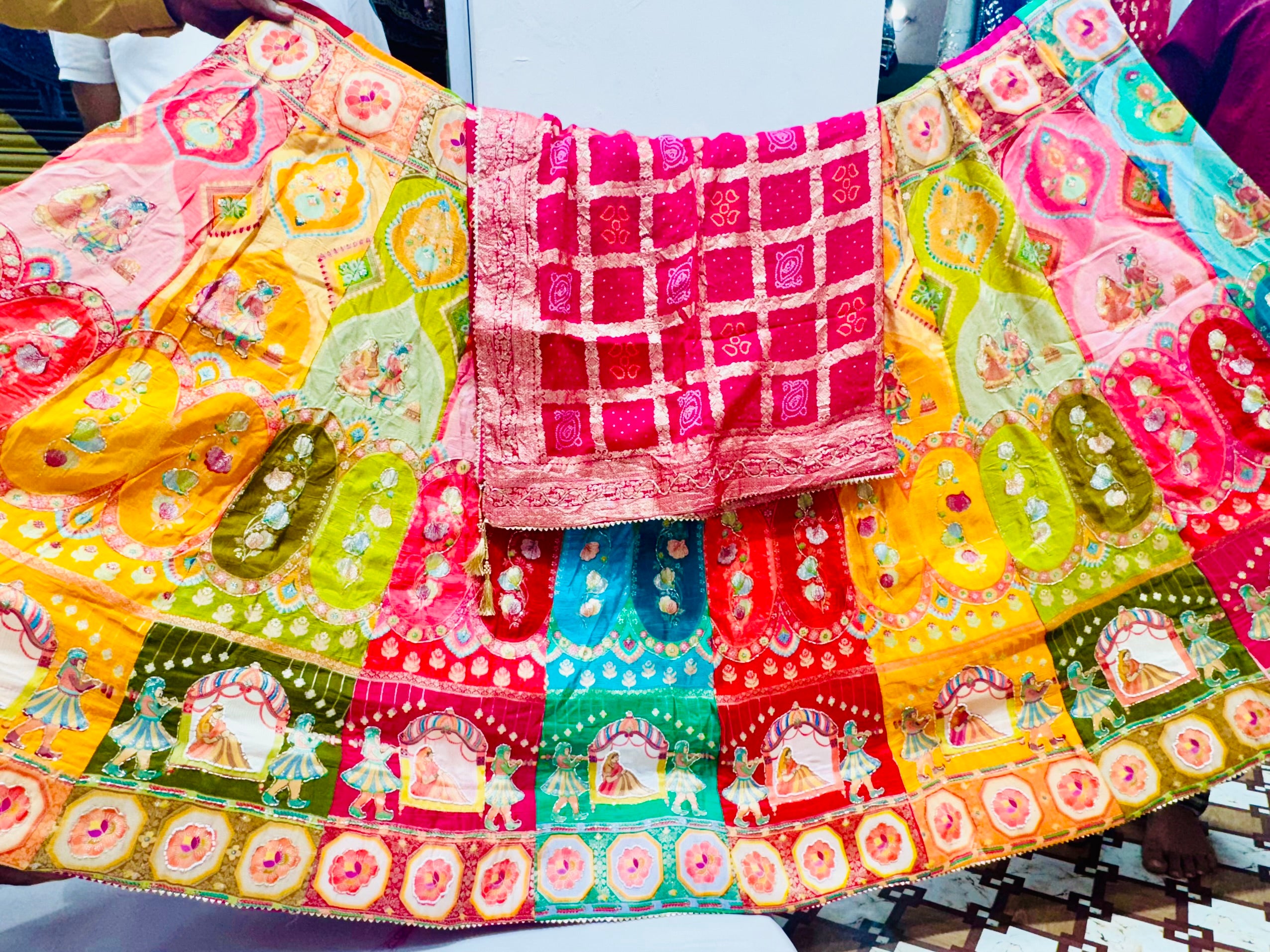 Rajwadi multicolored lehnga with beautiful highlighting of cutdana and pearls.