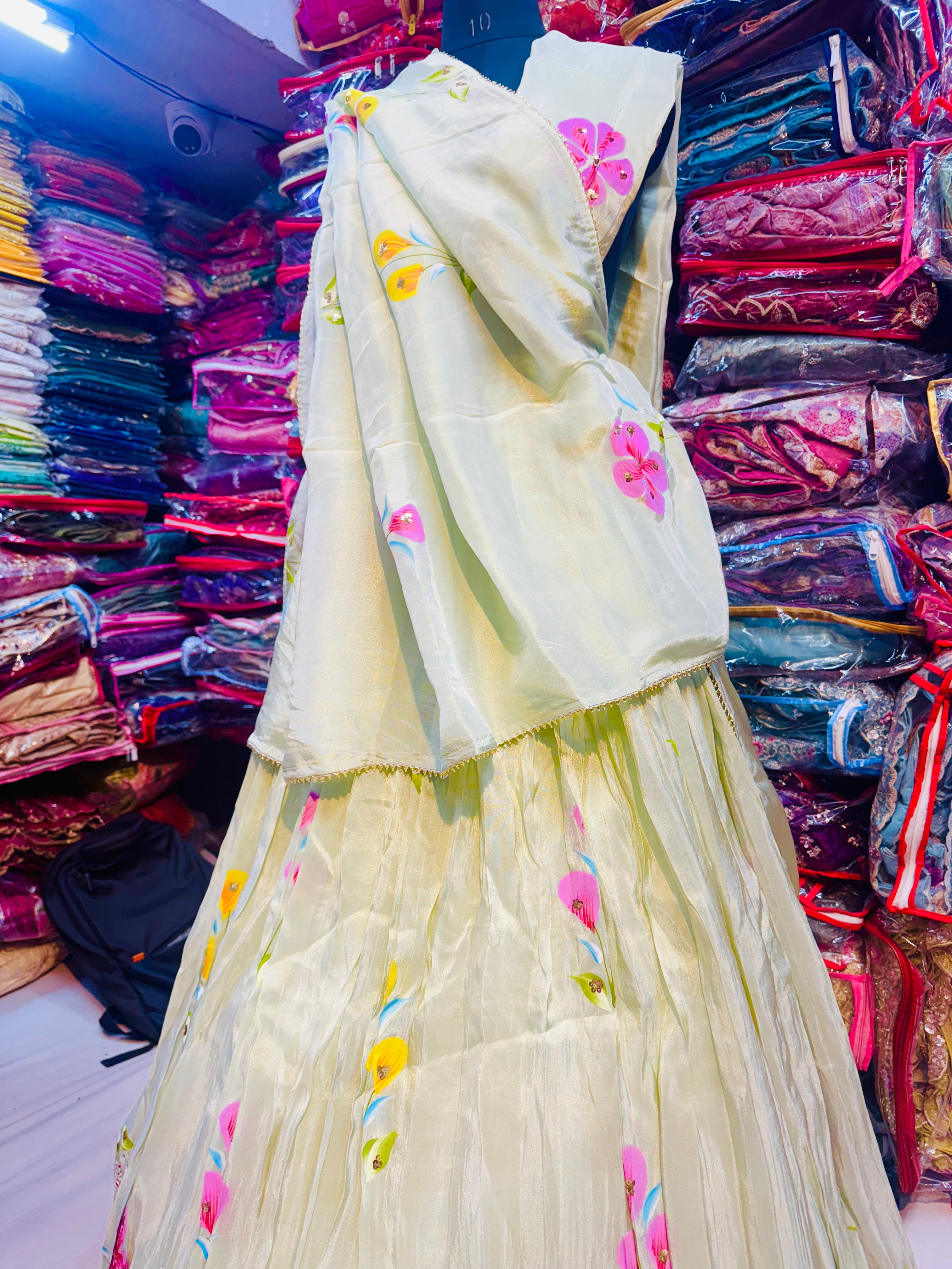 Pista green floral handpainted lehnga on tissue fabric