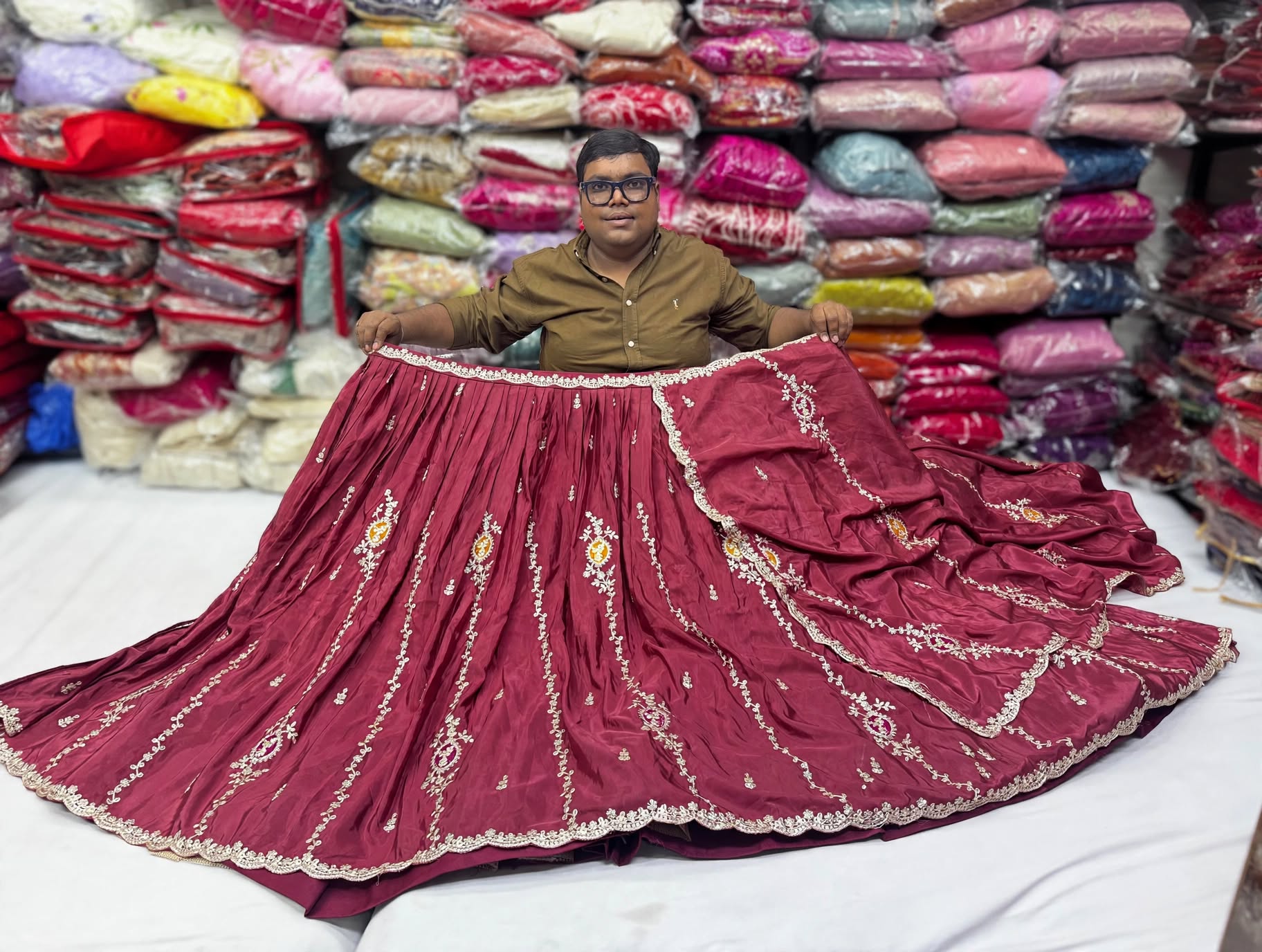 Exclusive silk embroidered lehnga with jari work