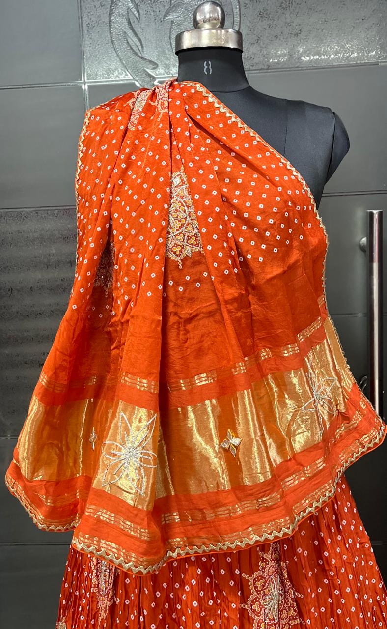 Gajjisilk bandhej print lehnga with beautiful work of sikhiya gotta and concept of lagdi patta